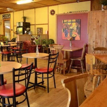 Interior of a cafe with tables for eating